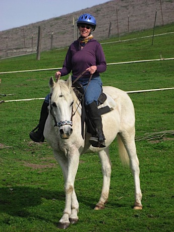 Scout Riding Horseback
